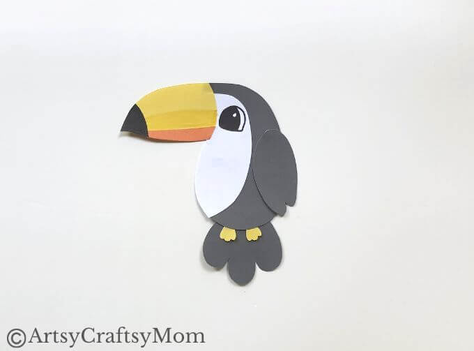 Here's a fun and easy toucan bookmark craft for kids of all ages to try! All you need are basic supplies like craft papers, scissors, glue & Sharpies!