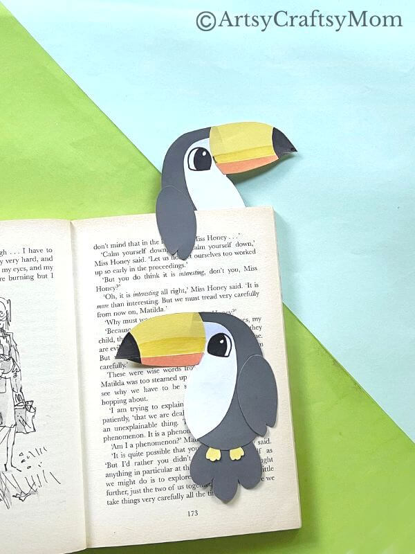 Here's a fun and easy toucan bookmark craft for kids of all ages to try! All you need are basic supplies like craft papers, scissors, glue & Sharpies!