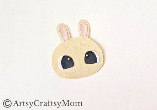 Cute Spring Bunny Papercraft with Printable Template 4 All you need is colored craft paper and cardstock to make this adorable spring bunny papercraft! Great even for crafting beginners and little ones!