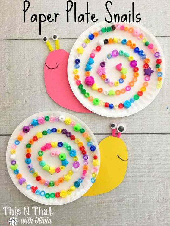 Everyone will love these snappy & colorful snail crafts for kids! Perfect for young kids to explore their creativity with yarn, paint, paper plates & more!