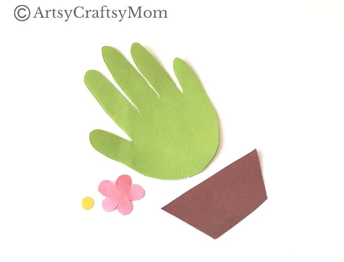 Here's a cute & easy Handprint Cactus Papercraft for Kids to try out this summer! Use the handprints provided or use the outline of your own hands!