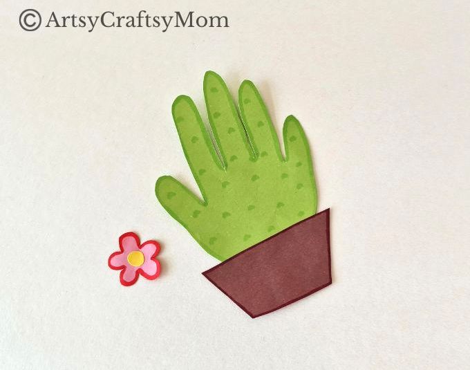 Here's a cute & easy Handprint Cactus Papercraft for Kids to try out this summer! Use the handprints provided or use the outline of your own hands!