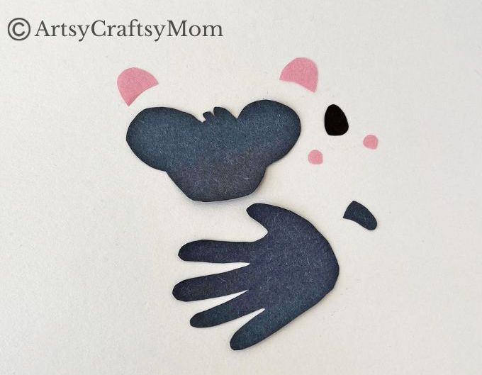 Here's a super cute Handprint Koala Craft for Kids to make with basic craft supplies - and their handprints! Great for learning about marsupials!