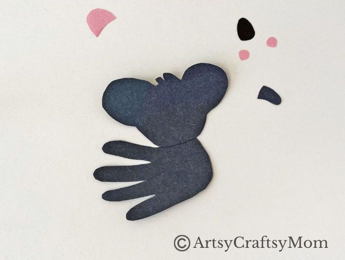 Here's a super cute Handprint Koala Craft for Kids to make with basic craft supplies - and their handprints! Great for learning about marsupials!