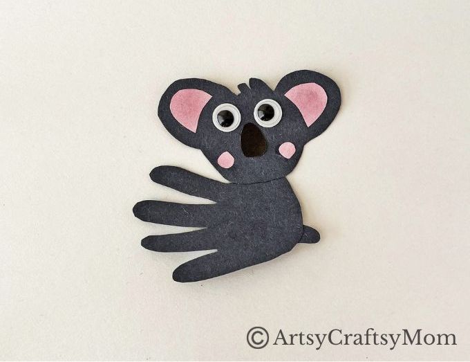 Here's a super cute Handprint Koala Craft for Kids to make with basic craft supplies - and their handprints! Great for learning about marsupials!