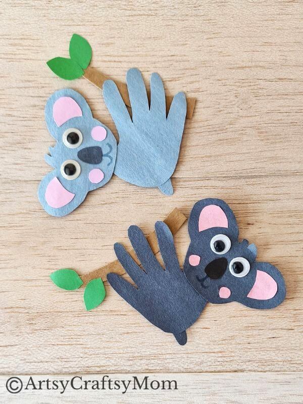 Here's a super cute Handprint Koala Craft for Kids to make with basic craft supplies - and their handprints! Great for learning about marsupials!