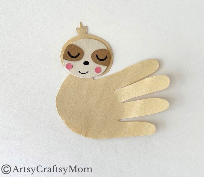 Kids will love making this cute Handprint Sloth Craft - especially since they can see their own handprints in it! Perfect for preschoolers & young kids,