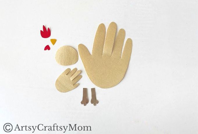 Here's a cute little handprint chicken craft that's super easy to make! Perfect for learning about farm life, domestic birds or about the letter C!