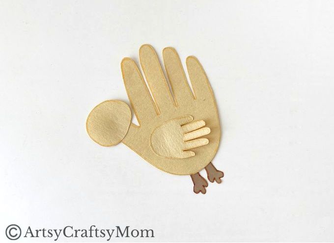 Here's a cute little handprint chicken craft that's super easy to make! Perfect for learning about farm life, domestic birds or about the letter C!
