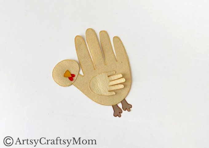 Here's a cute little handprint chicken craft that's super easy to make! Perfect for learning about farm life, domestic birds or about the letter C!