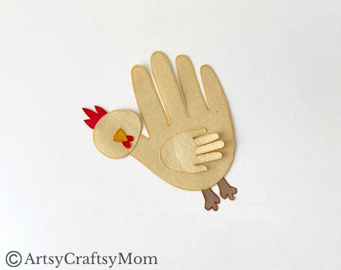 Here's a cute little handprint chicken craft that's super easy to make! Perfect for learning about farm life, domestic birds or about the letter C!