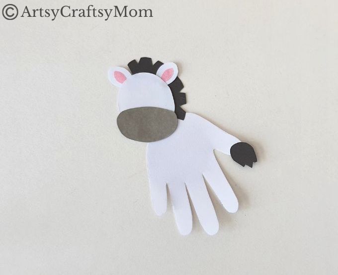Learn some fun facts about the zebra as you make this easy and fun handprint zebra craft! Perfect for young kids like toddlers and preschoolers!