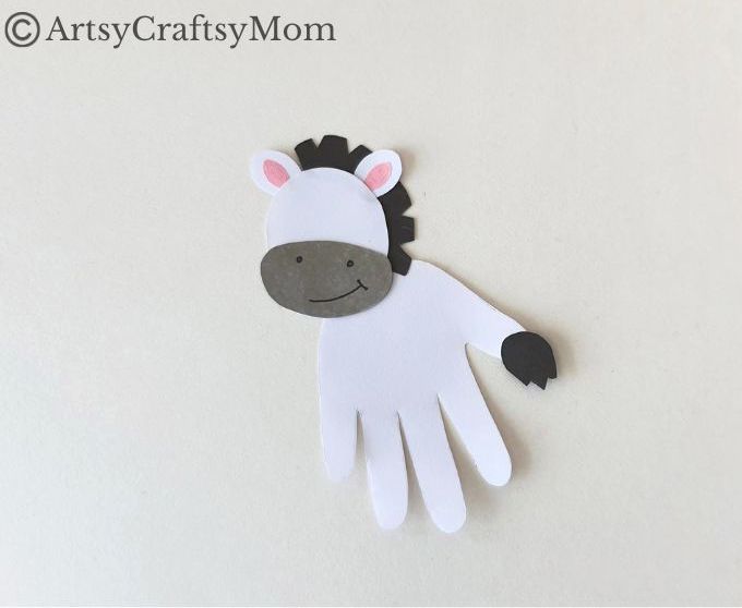 Learn some fun facts about the zebra as you make this easy and fun handprint zebra craft! Perfect for young kids like toddlers and preschoolers!