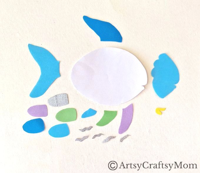 Celebrate the timeless classic 'The Rainbow Fish' with a gorgeous rainbow fish papercraft for kids! If you haven't read it yet, now's a great time for it!