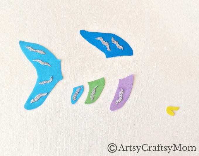 Celebrate the timeless classic 'The Rainbow Fish' with a gorgeous rainbow fish papercraft for kids! If you haven't read it yet, now's a great time for it!