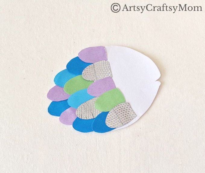 Celebrate the timeless classic 'The Rainbow Fish' with a gorgeous rainbow fish papercraft for kids! If you haven't read it yet, now's a great time for it!
