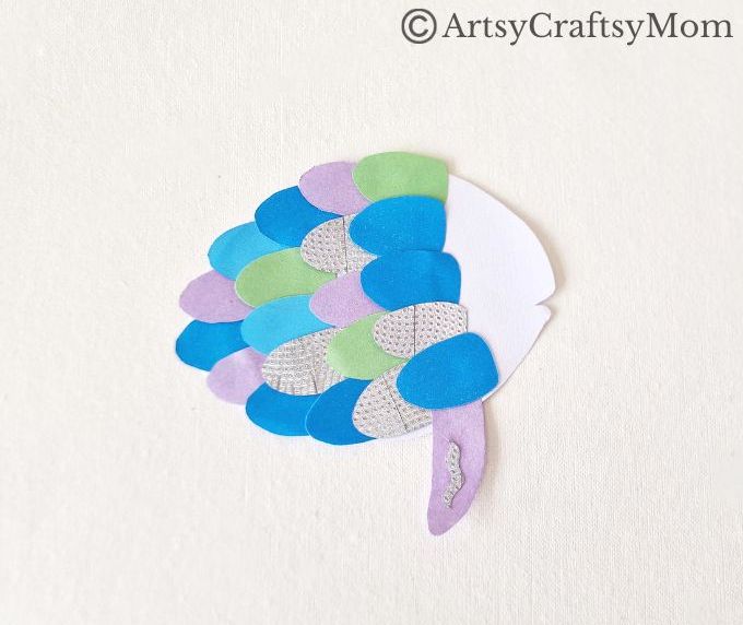 Celebrate the timeless classic 'The Rainbow Fish' with a gorgeous rainbow fish papercraft for kids! If you haven't read it yet, now's a great time for it!