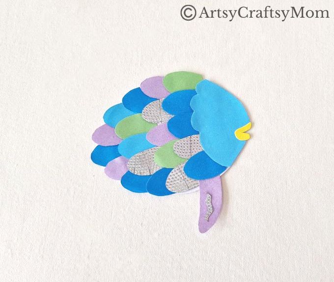 Celebrate the timeless classic 'The Rainbow Fish' with a gorgeous rainbow fish papercraft for kids! If you haven't read it yet, now's a great time for it!