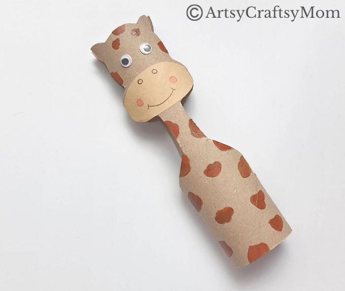 An empty cardboard tube beautifully transforms into the neck of this cute Toilet Paper Roll Giraffe Craft! Easy project for kids of all ages to try!