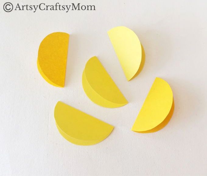 Try something different this holiday season - make a pretty 3D Christmas Ornament for your tree, entirely out of colored craft paper!