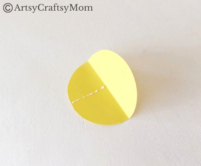 Try something different this holiday season - make a pretty 3D Christmas Ornament for your tree, entirely out of colored craft paper!