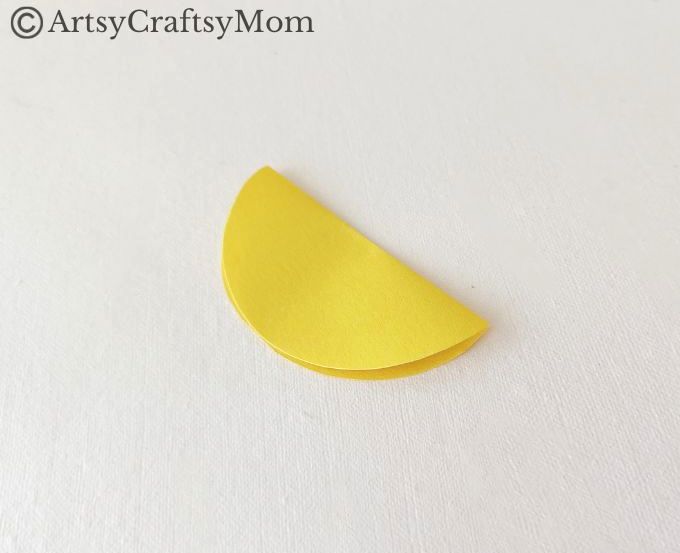 Try something different this holiday season - make a pretty 3D Christmas Ornament for your tree, entirely out of colored craft paper!