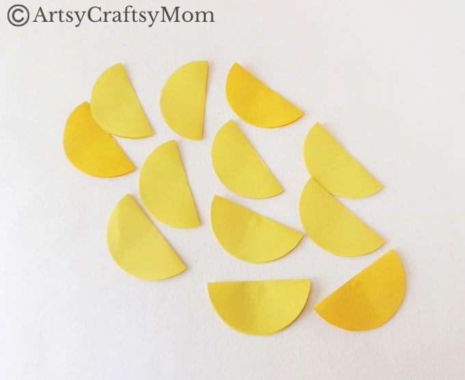 Try something different this holiday season - make a pretty 3D Christmas Ornament for your tree, entirely out of colored craft paper!