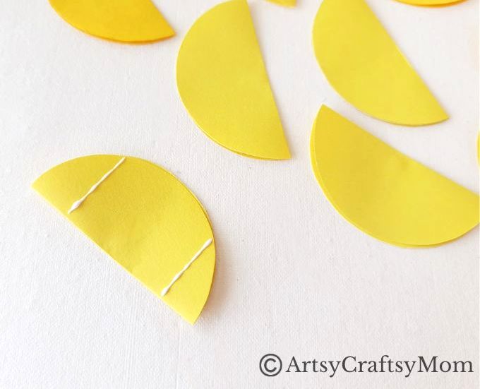 Try something different this holiday season - make a pretty 3D Christmas Ornament for your tree, entirely out of colored craft paper!