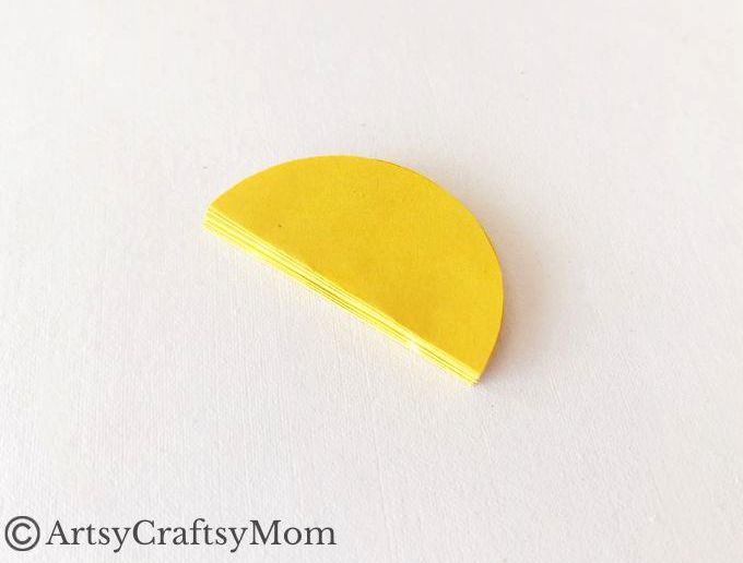 Try something different this holiday season - make a pretty 3D Christmas Ornament for your tree, entirely out of colored craft paper!