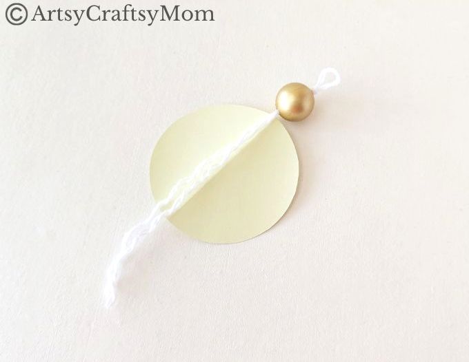 Try something different this holiday season - make a pretty 3D Christmas Ornament for your tree, entirely out of colored craft paper!