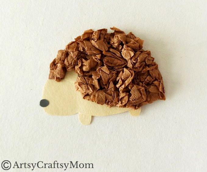 This crumpled paper hedgehog craft is super easy to make and great for young kids to exercise their fine motor muscles as they scrunch up paper!