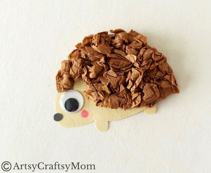 This crumpled paper hedgehog craft is super easy to make and great for young kids to exercise their fine motor muscles as they scrunch up paper!