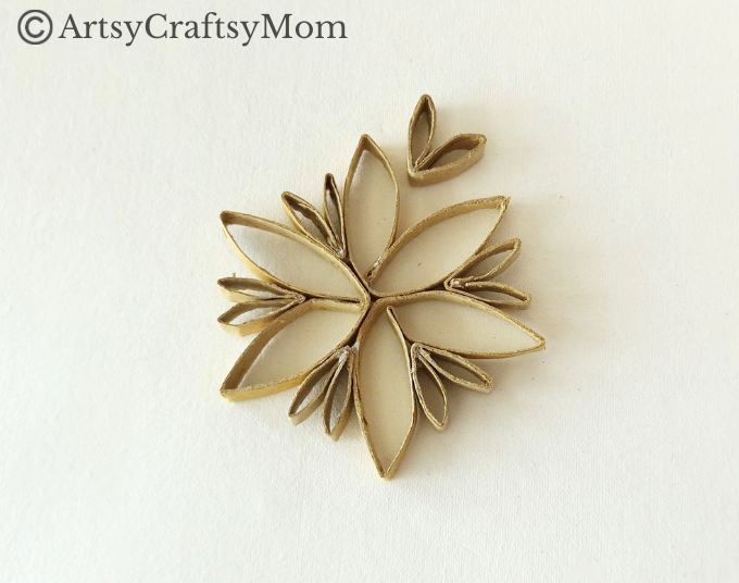 This DIY Toilet Paper Roll Snowflake Ornament is a gorgeous, rustic piece that will look wonderful hanging on your Christmas tree this year!
