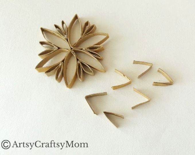 This DIY Toilet Paper Roll Snowflake Ornament is a gorgeous, rustic piece that will look wonderful hanging on your Christmas tree this year!