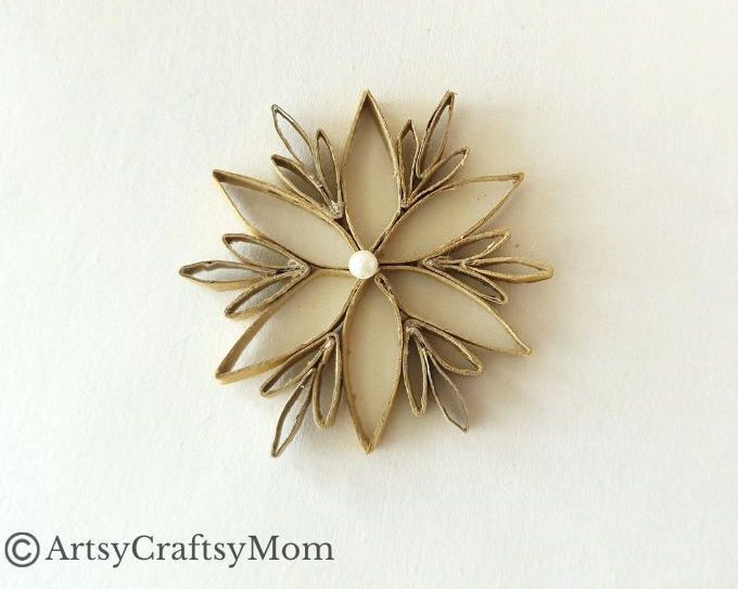 This DIY Toilet Paper Roll Snowflake Ornament is a gorgeous, rustic piece that will look wonderful hanging on your Christmas tree this year!