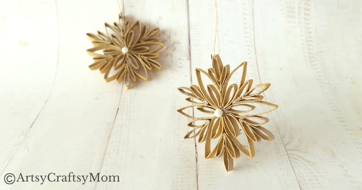 This DIY Toilet Paper Roll Snowflake Ornament is a gorgeous, rustic piece that will look wonderful hanging on your Christmas tree this year!