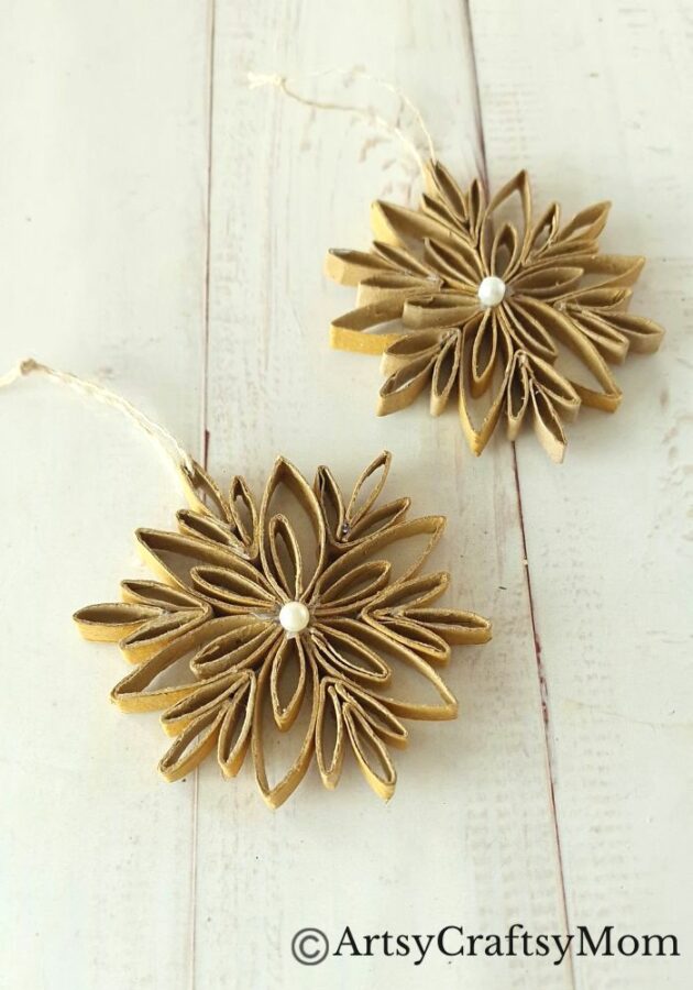 This DIY Toilet Paper Roll Snowflake Ornament is a gorgeous, rustic piece that will look wonderful hanging on your Christmas tree this year!