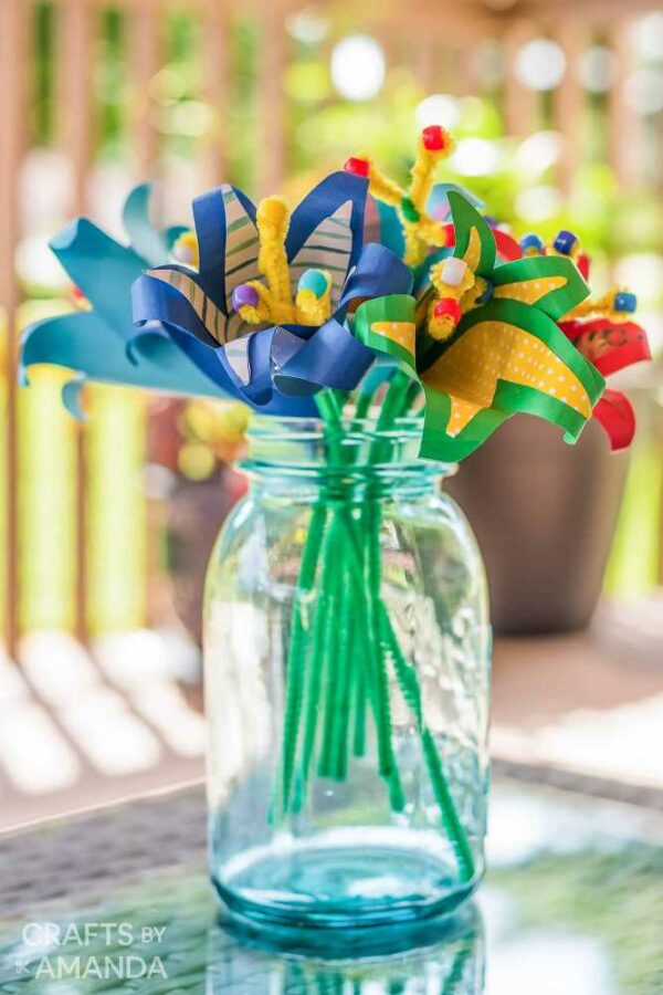Here are some gorgeous Flower Crafts for Kids that are perfect for Summer-&nbsp; tissue paper cherry blossoms, lilies, sunflowers, heliconias and more!