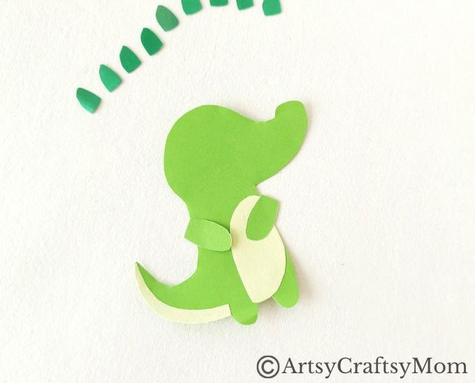 Add some bite to your reading with this fun alligator bookmark papercraft! Easy to make with just colored craft paper and basic craft supplies!