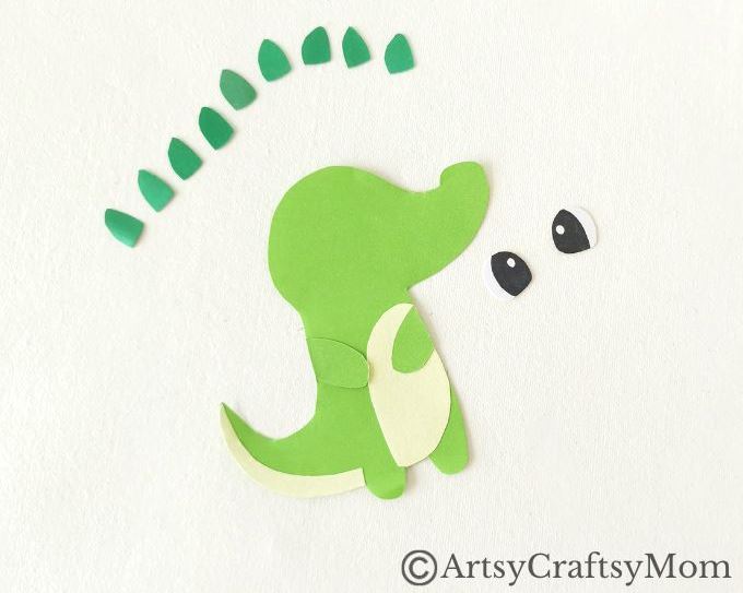 Add some bite to your reading with this fun alligator bookmark papercraft! Easy to make with just colored craft paper and basic craft supplies!