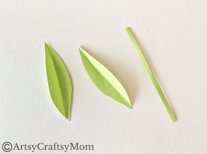 Here's a pretty daffodil papercraft for kids to make for spring or for Daffodil Day. It's a simple craft for which all you need is paper, scissors & glue!